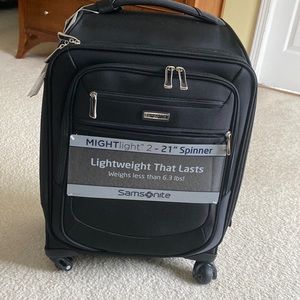 Samsonite mighty light 2 BRAND NEW carrier on Suitcase